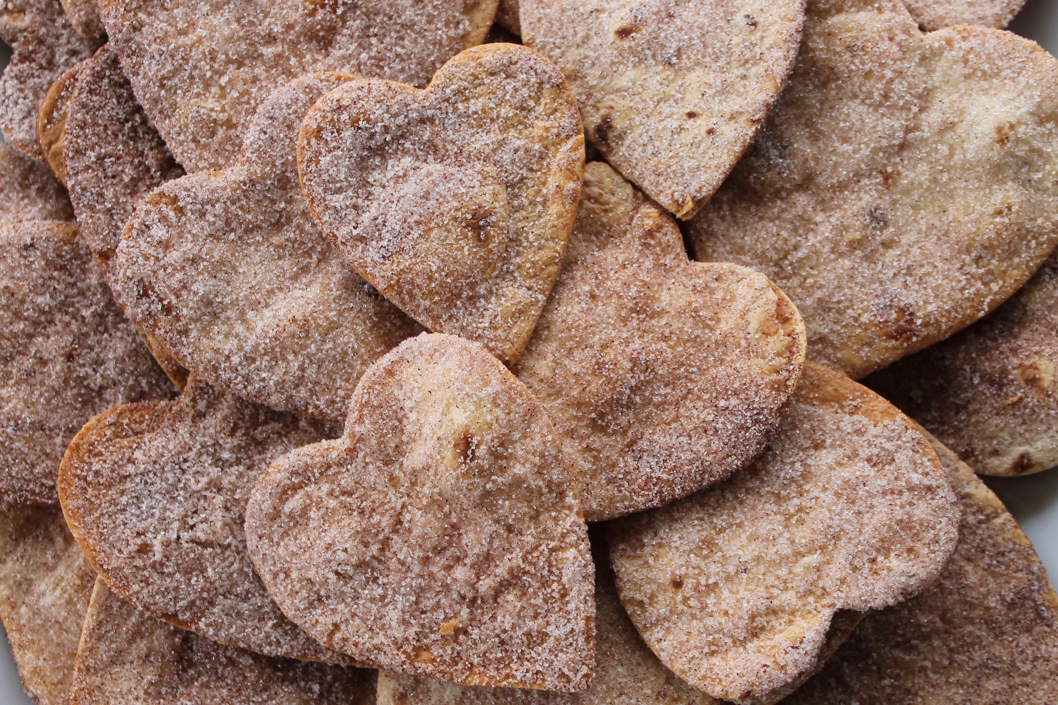 Heart shaped tortillas covered in cinnamon and sugar