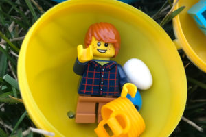 Lego guy in a yellow Easter Egg