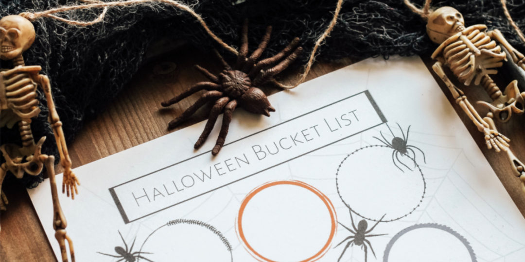 Blank Halloween Bucket List on wood with spider and skeletons